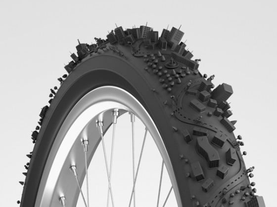 Bike City - Illustrazione 3D di una città attorno a uno pneumatico