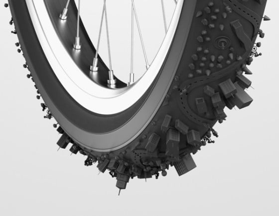 Bike City - Illustrazione 3D di una città attorno a uno pneumatico