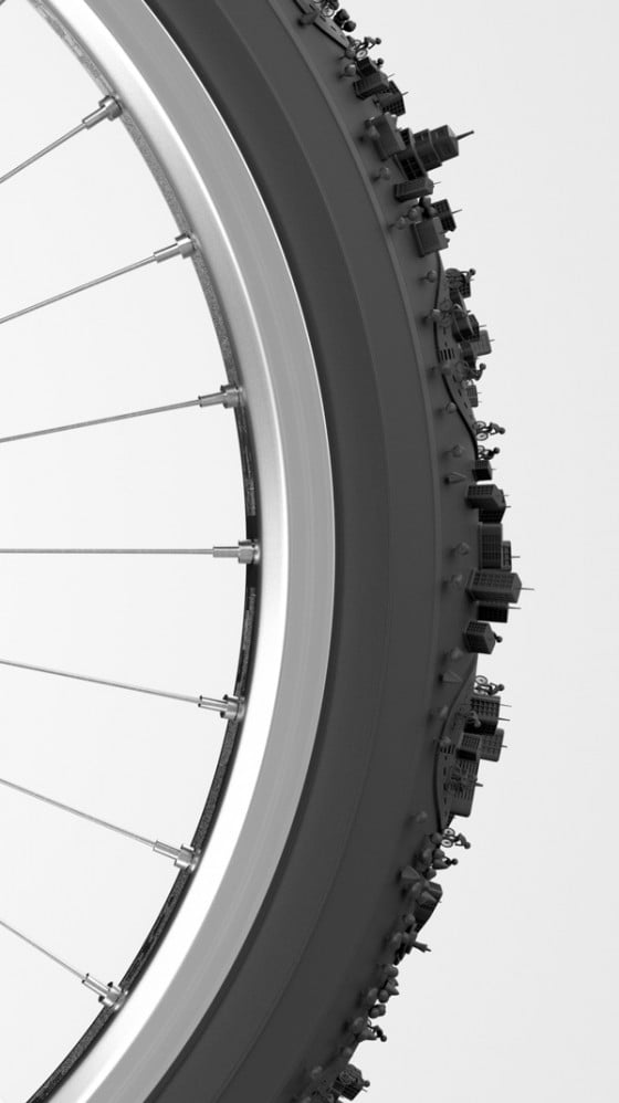 Bike City - Illustrazione 3D di una città attorno a uno pneumatico