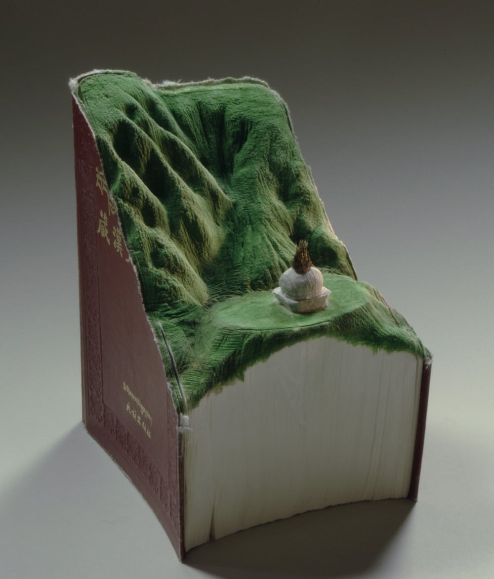 Book Sculptures, i libri trasformati in paesaggi da Guy Laramée | Collater.al