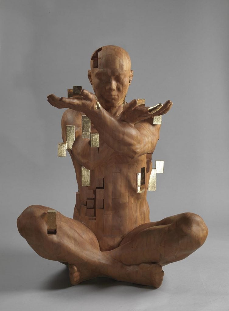 Le sculture di Han Hsu Tung si dissolvo in cubi pixelati | Collater.al